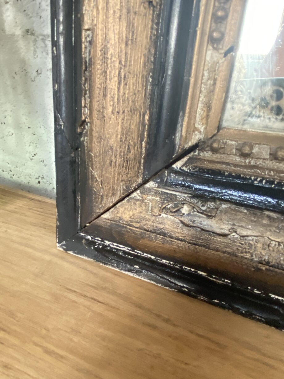 Miroir ancien noir et doré