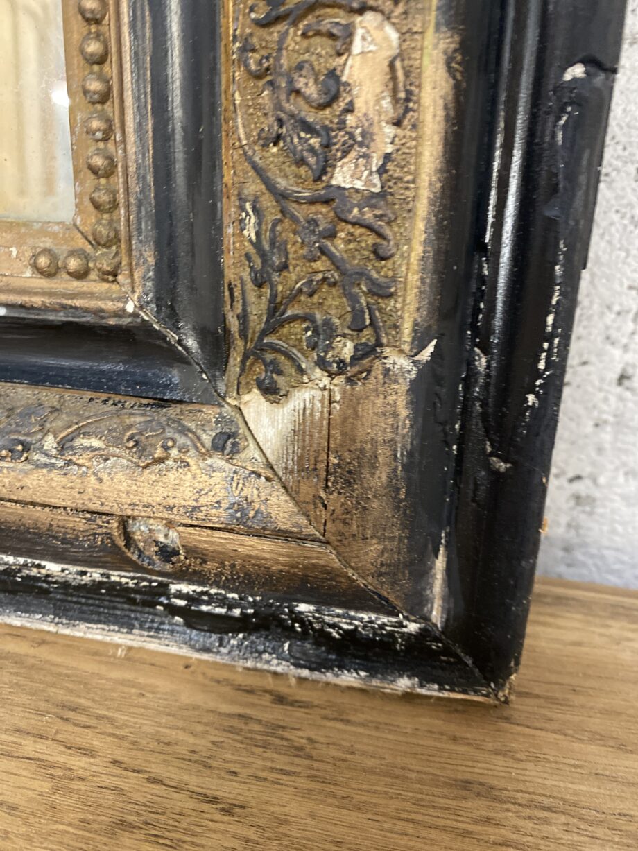 Miroir ancien noir et doré