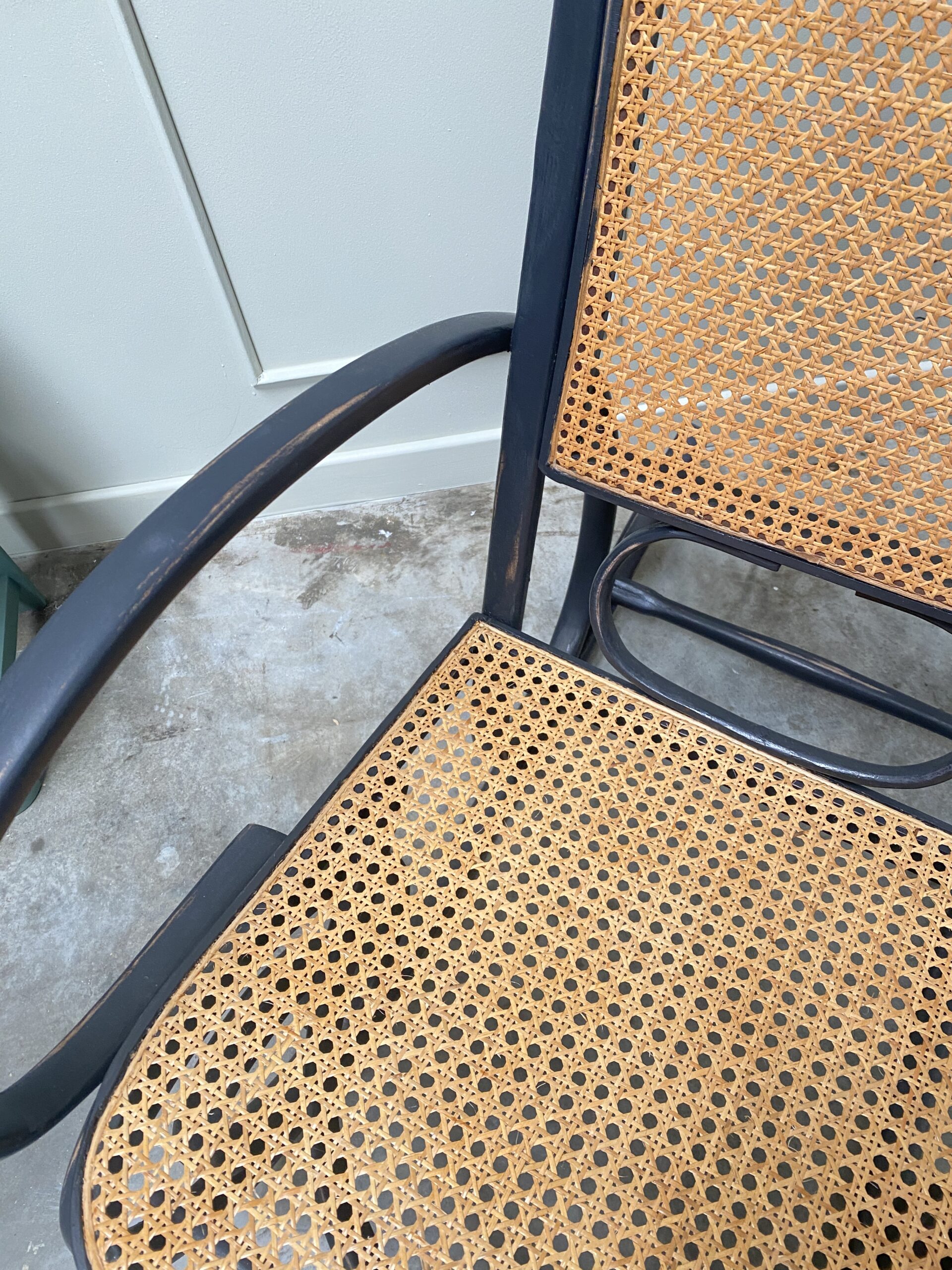 Rocking chair en cannage