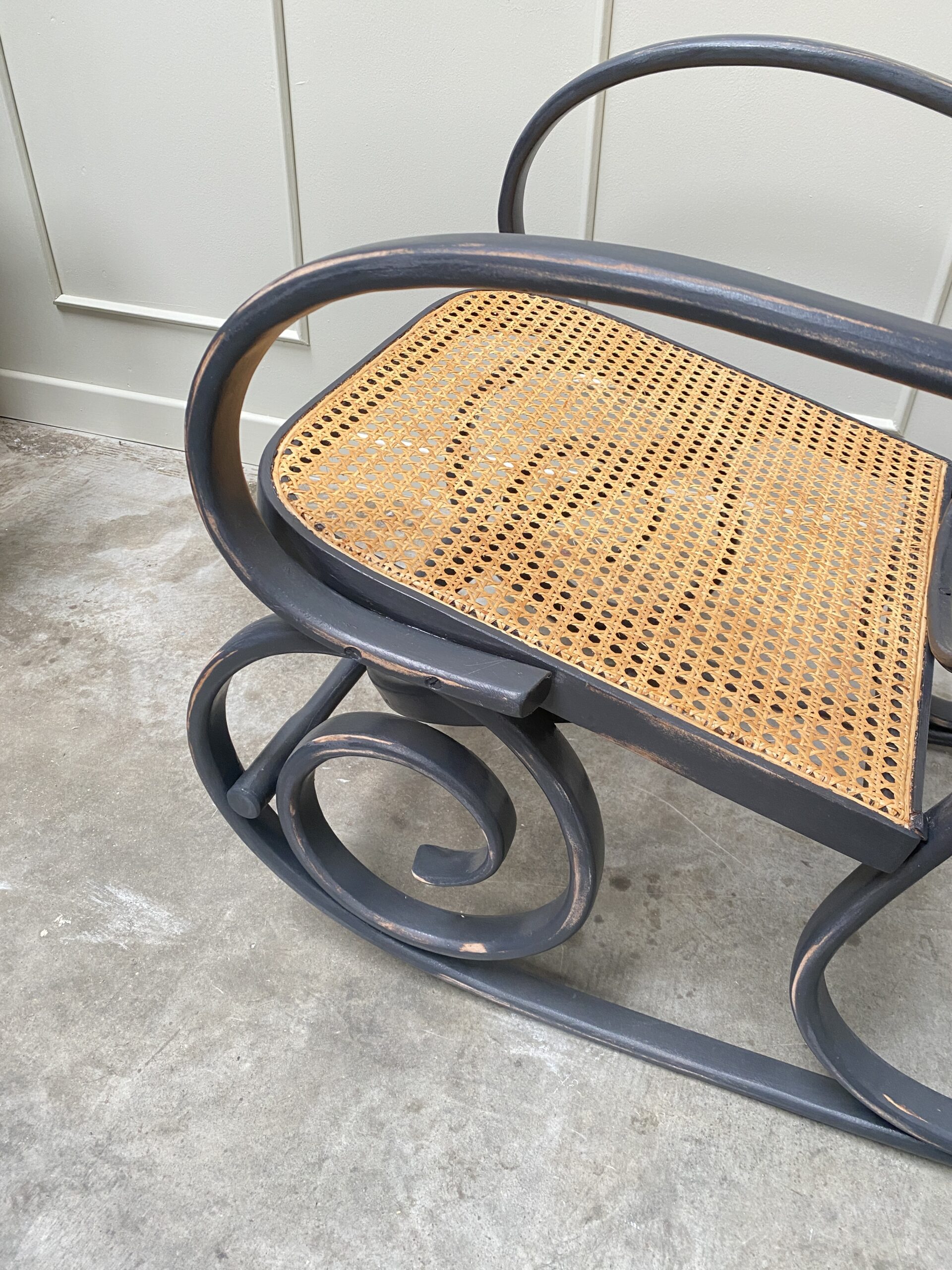 Rocking chair en cannage