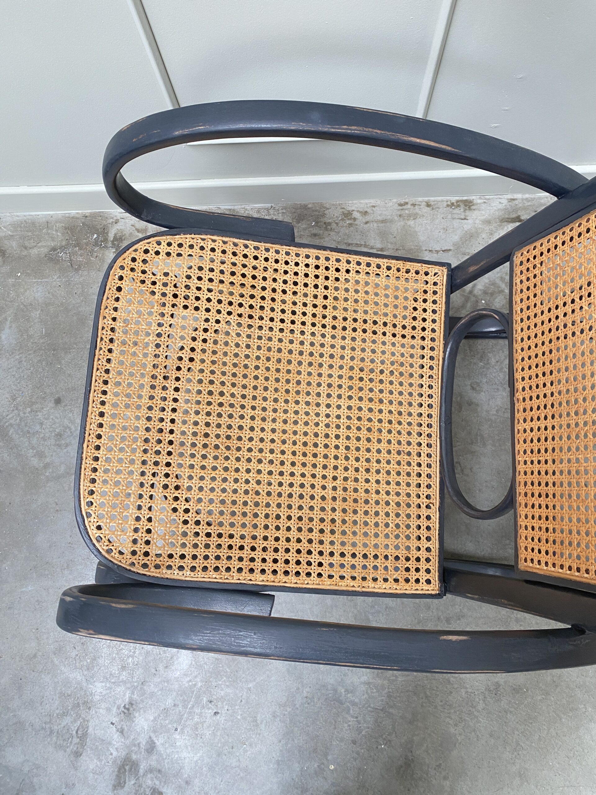 Rocking chair en cannage